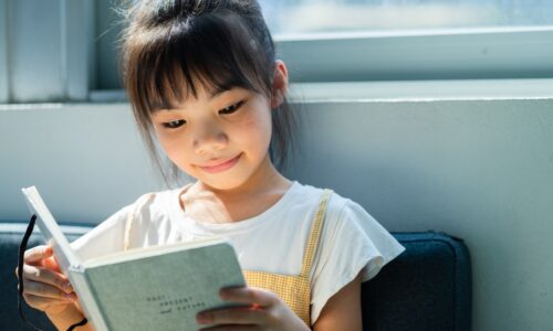a girl reading a book
