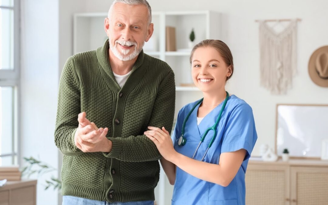 Elderly Male with Parkinson's being assisted by an in home care specialist
